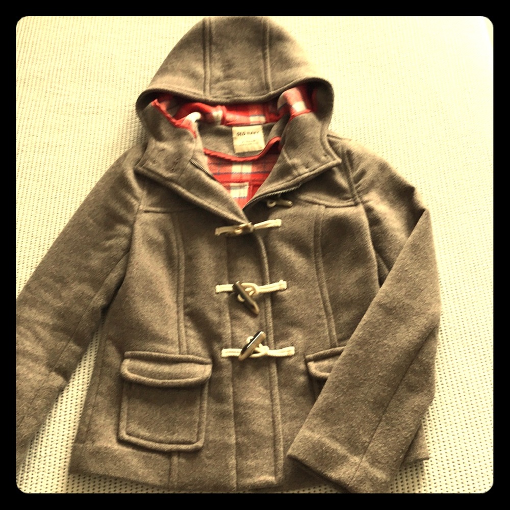 Greige peacoat with orange plaid lining.
